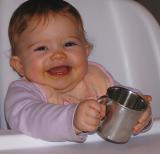Photo of a Very Satisfied Customer with her Baby Cup