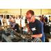 Photo of Jon Gibson Turning Pewter at Sunapee Fair